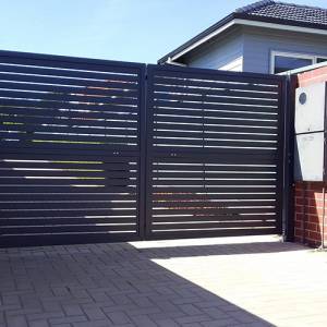 Auckland's custom black aluminum gate offers secure property access and modern curb appeal.